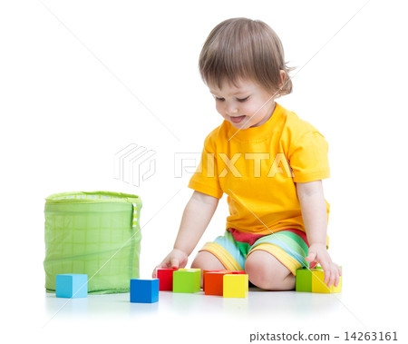 kid boy playing wooden toys kid boy playing wooden toys 14263161