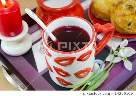 Lip patterned cup of tea on a tray 14269109