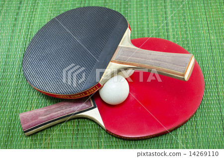 Two vintage table tennis rackets and ping pong balls Two vintage table tennis rackets and ping pong balls 14269110