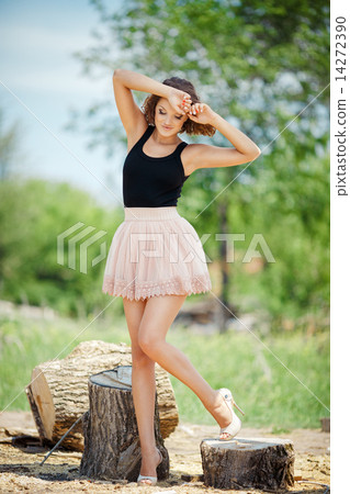 Sexy young woman posing outdoors Sexy young woman posing outdoors 14272390