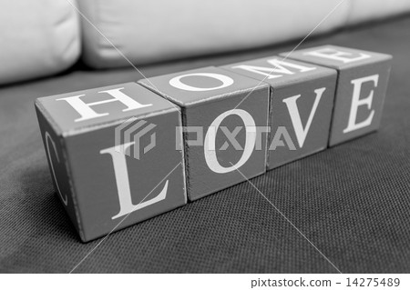 Conceptual photo of words "home" and "love" spelled on bricks 14275489
