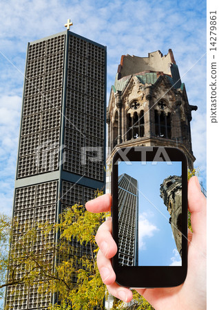 tourist taking photo of kaiser wilhelm church tourist taking photo of kaiser wilhelm church 14279861
