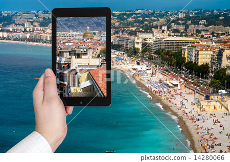tourist taking photo of Nice city on Azure coast 14280066