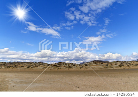 Sand hills and blue sky with clouds 14280554