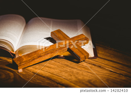 Open bible with crucifix icon 14282410