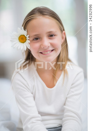 Cute little girl smiling at camera Cute little girl smiling at camera 14282996