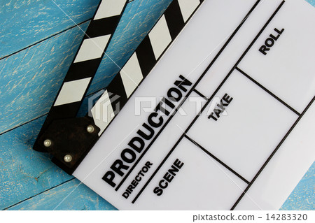 Movie slate film on blue wooden table 14283320