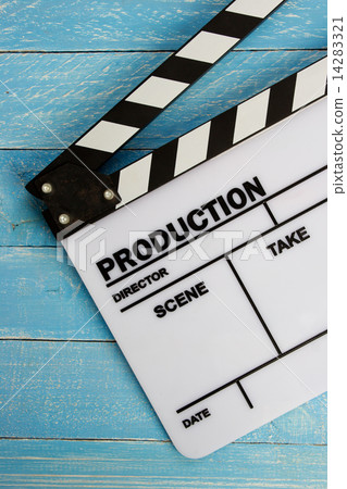 Movie slate film on blue wooden table 14283321