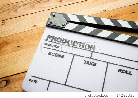 Movie slate film on wooden table Movie slate film on wooden table 14283333