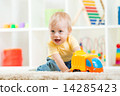 child boy toddler playing with toy car 14285423