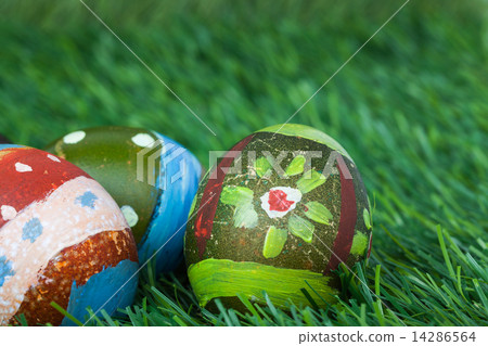 Happy easter eggs festival event on grass,can use as background. Happy easter eggs festival event on grass,can use as background. 14286564