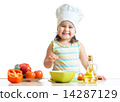 toddler girl preparing healthy food in the kitchen 14287129