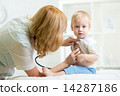 pediatrician examining heartbeat of kid with stethoscope 14287186