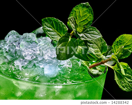 Green cocktail on dark background. Green cocktail on dark background. 14288342