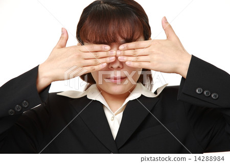 Business woman covering eyes Business woman covering eyes 14288984