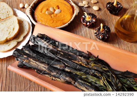 barbecued calcots, sweet onions, and romesco sauce typical of Ca barbecued calcots, sweet onions, and romesco sauce typical of Ca 14292390