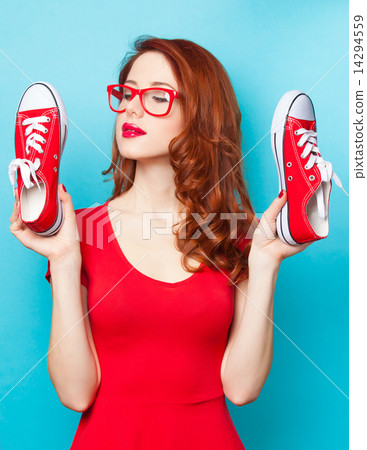 girl in red dress with gumshoes 14294559