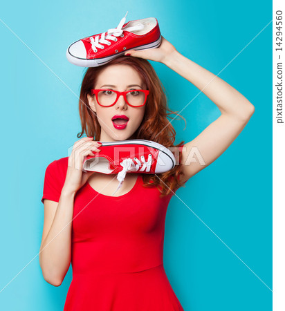 girl in red dress with gumshoes 14294560
