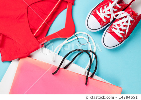 gumshoes with white shoelaces and shopping bags with dress gumshoes with white shoelaces and shopping bags with dress 14294651