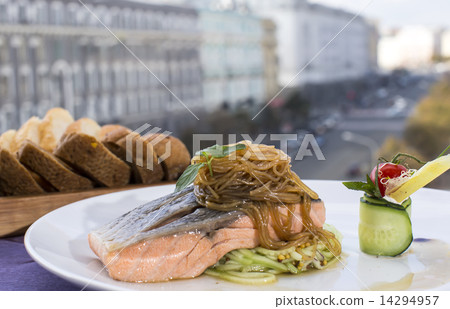 Baked salmon fillet with vegetables in a restaurant 14294957