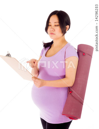 Pregnant asian woman isolated on white with sign Pregnant asian woman isolated on white with sign 14296283