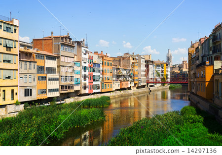 view of river and picturesque houses in Girona 14297136