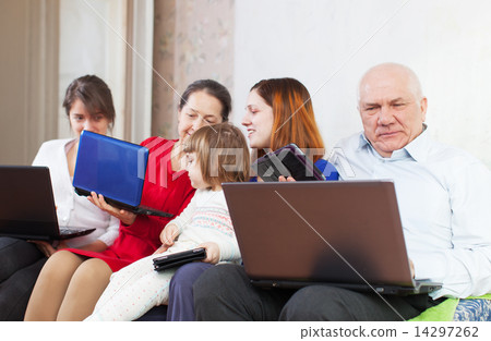 family enjoys few laptops at home 14297262