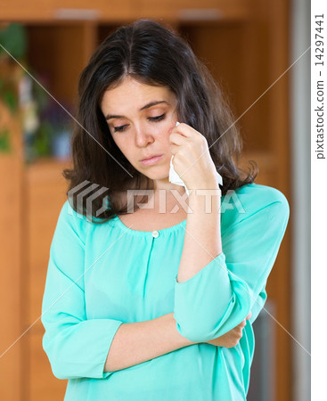 woman crying at home woman crying at home 14297441