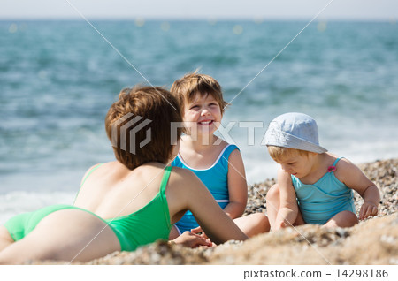 mother with happy children at sand beach 14298186