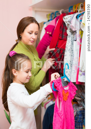 Daughter and mom choosing apparel Daughter and mom choosing apparel 14298390