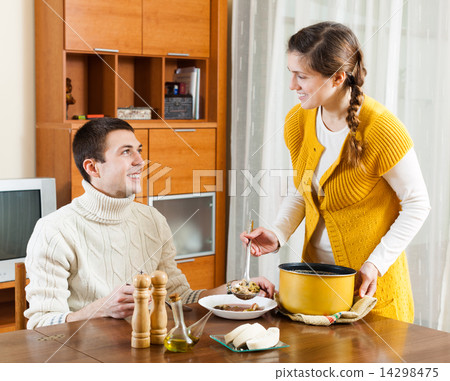 Girl serving lunch 14298475