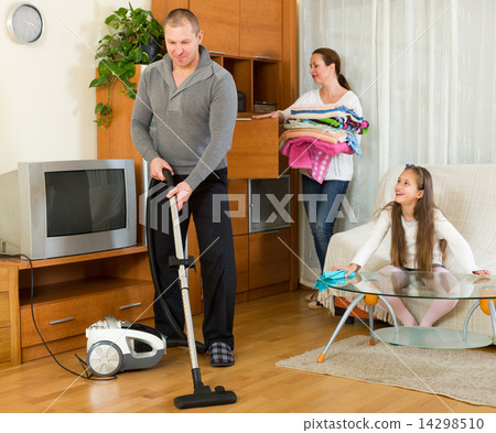 girl helping happy parents to clean girl helping happy parents to clean 14298510
