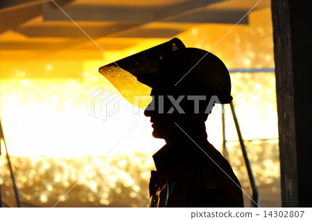 worker with hot steel 14302807