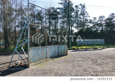 Grass baseball scoreboard and back net 14303313