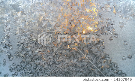 Ice pattern on winter glass Ice pattern on winter glass 14307949