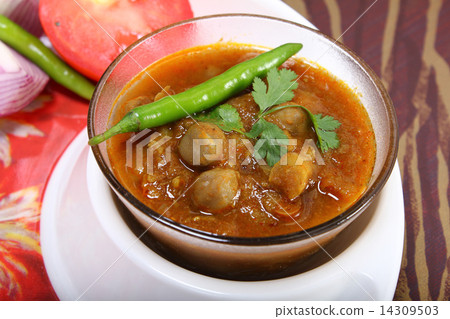 indian spicy chana masala with raw chickpeas and green chilli to 14309503