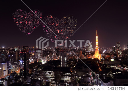 heart sparkle Fireworks celebrating over Tokyo cityscape at nigh 14314764