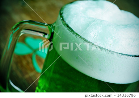 mug with dyed green beer and three-leaved shamrock, for saint pa mug with dyed green beer and three-leaved shamrock, for saint pa 14316796