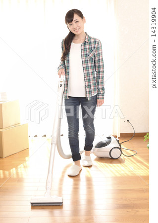 A woman cleaning it 14319904
