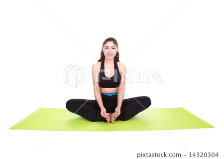 Young woman doing yoga exercise with yoga mat 14320304