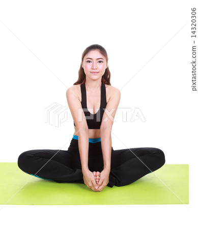 Young woman doing yoga exercise with yoga mat Young woman doing yoga exercise with yoga mat 14320306
