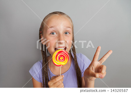 happy girl with lollipop happy girl with lollipop 14320587