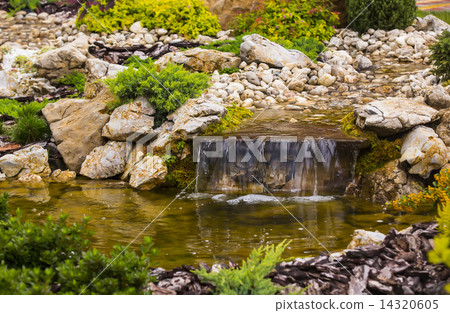 waterfall in the park in the summer on the nature 14320605