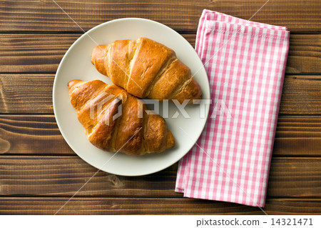 top view of croissants on plate 14321471