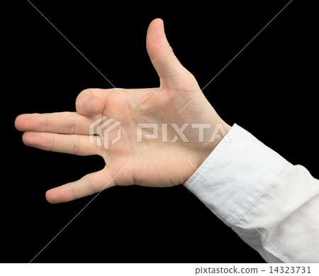 Hand emitting a dog on black 14323731
