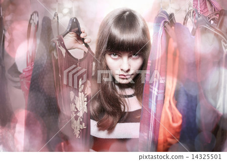 dangerous teenage girl with her wardrobe,backlit, bokeh and ligh 14325501