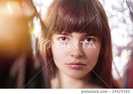 portrait of a beautiful teenage girl, with light leak and bokeh 14325503