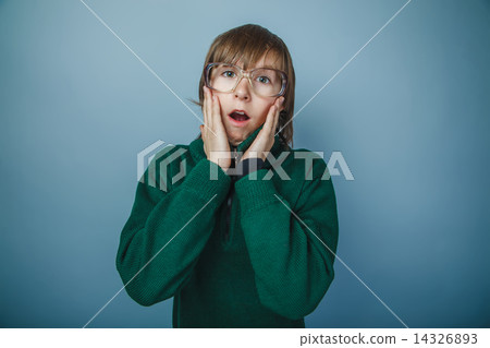 teenager boy brown hair European appearance in green sweater ret 14326893