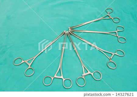 Surgical instruments on sterile table 14327621