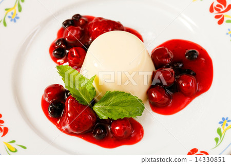 Panna cotta with berry sauce 14330851